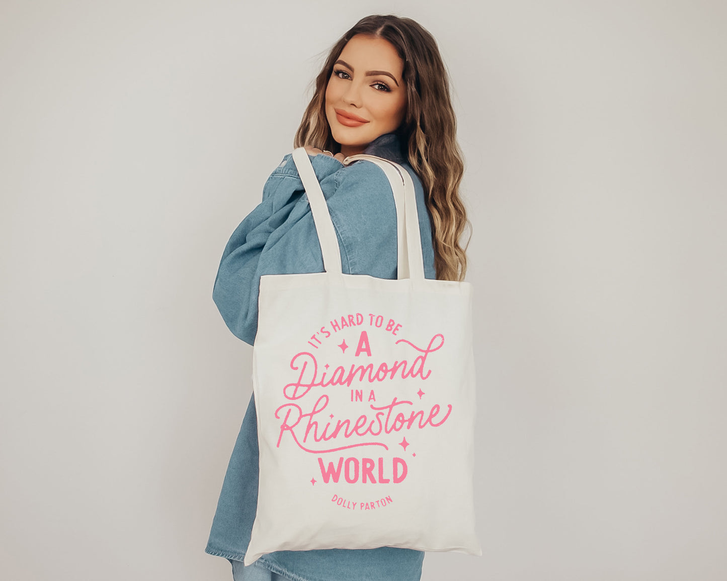 “It’s hard to be a diamond in a rhinestone world” Tote Bag